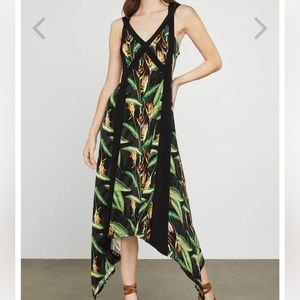 Leafy green patterned stretch material strappy dress. BCBG, size XL